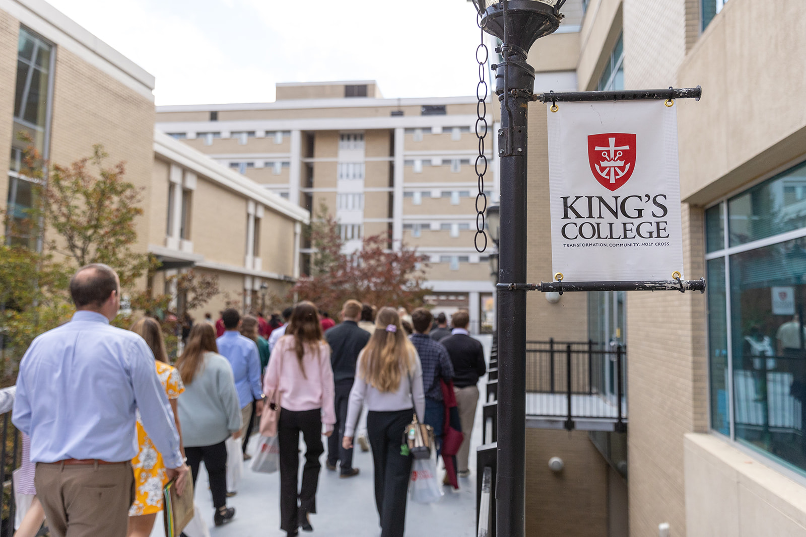 students walking around college campus