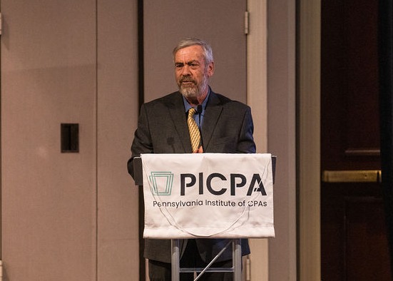 PA DOR Secretary Pat Browne standing at a podium