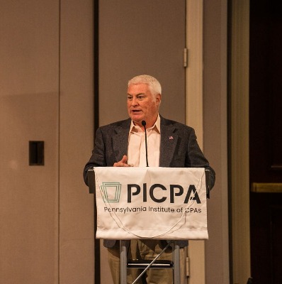 State Rep. Keith Greiner speaking at a podium