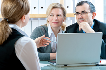 Small-business couple with CPA adviser