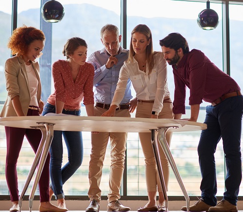 Leadership team discusses post-merger integration.