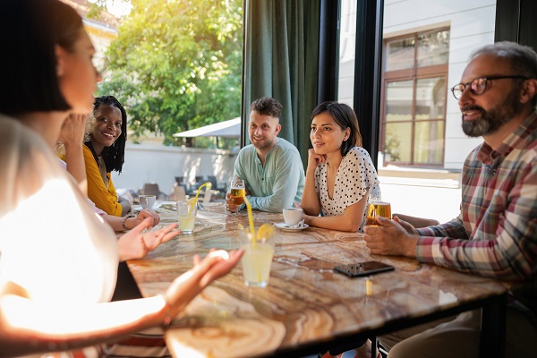 A relaxed gathering around a table for a discussion group