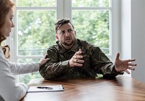 VeteranBeingCounseled Veteran being counseled about finances