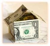 Small house made of dollar bills