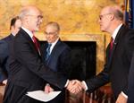 Gov. Tom Wolf shakes hands with PICPA's Peter Calcara