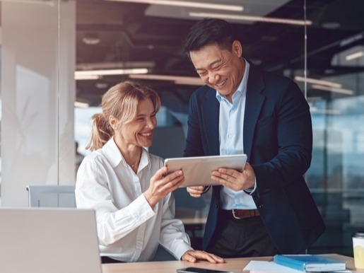 Business woman and man in an office