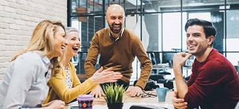 Four coworkers meeting and connecting.