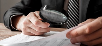 Investigating financial docs with magnifying glass