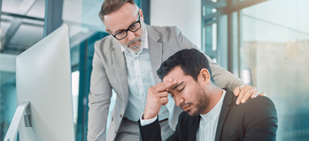 Manager consoling a distraught coworker