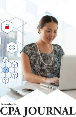 Journal image of woman at laptop with security icons