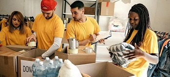Four volunteers working at a community charity