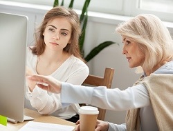 CPA partner mentors a younger coworker