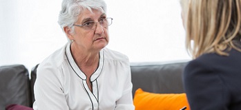 Client discussing retirement funds with adviser